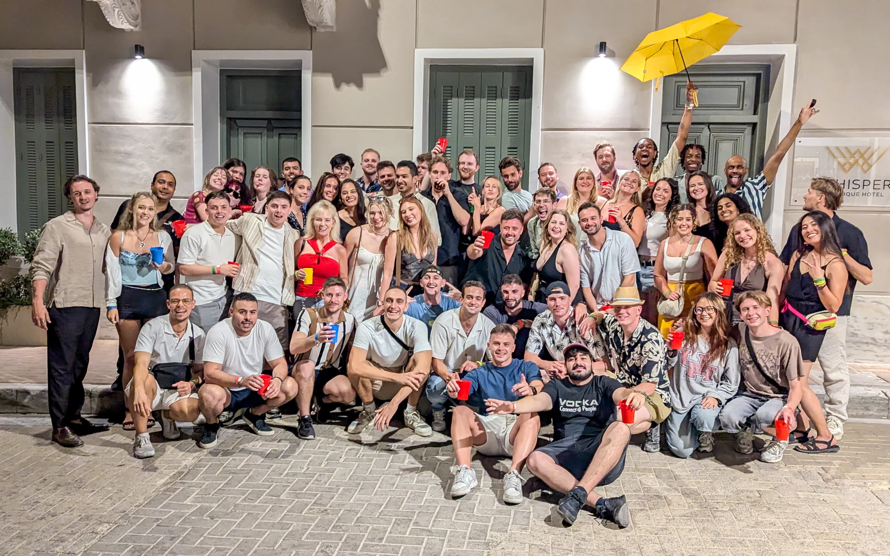 Group of international international friends enjoying safe athens nightlife pub crawl tour at Athens pub crawl in Athens