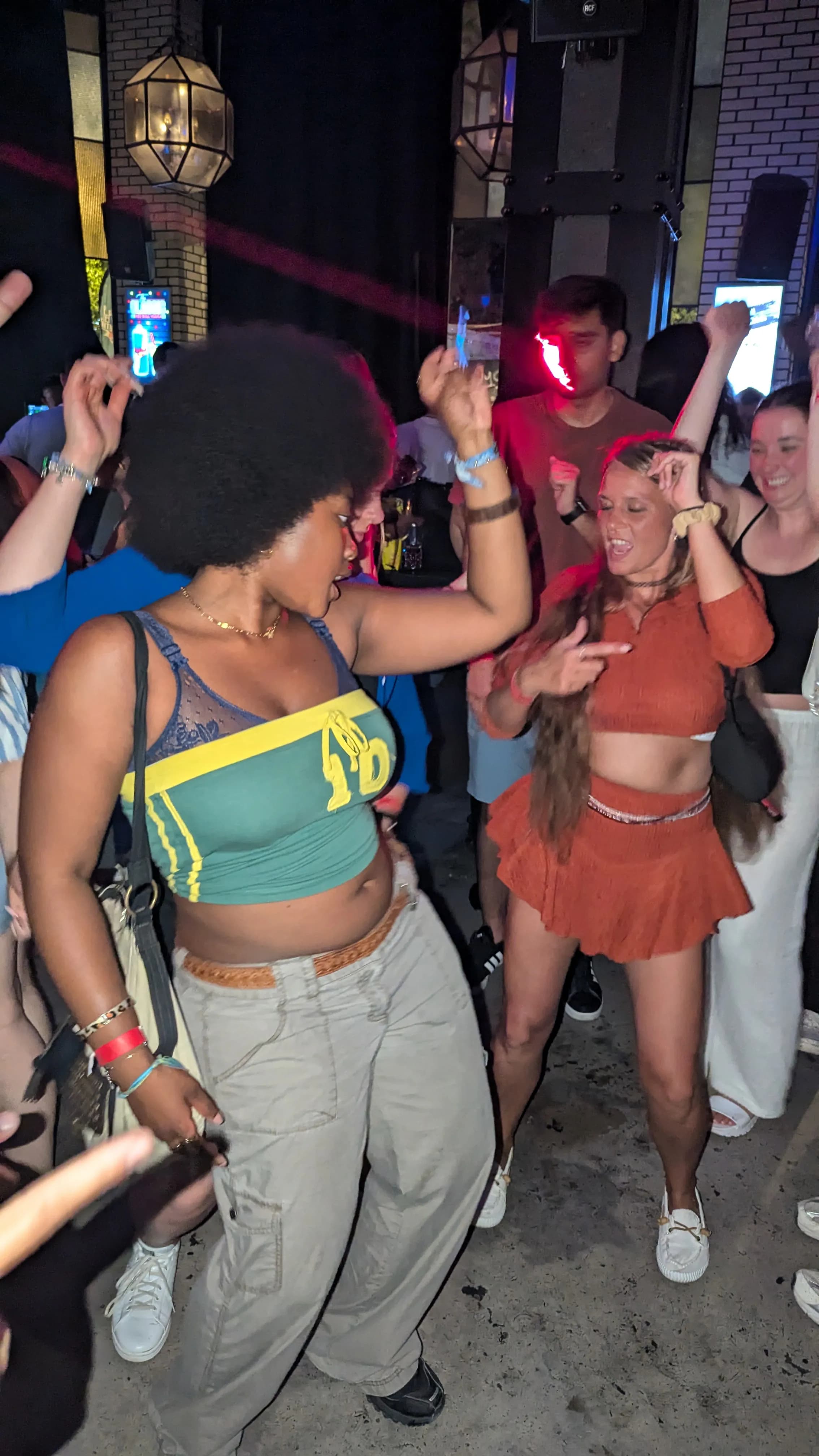 Group of international international friends enjoying safe athens nightlife pub crawl tour at Athens pub crawl in Athens